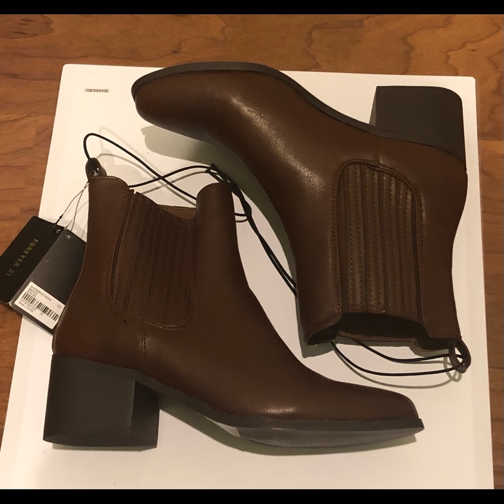 Brown booties with heel. Size 6